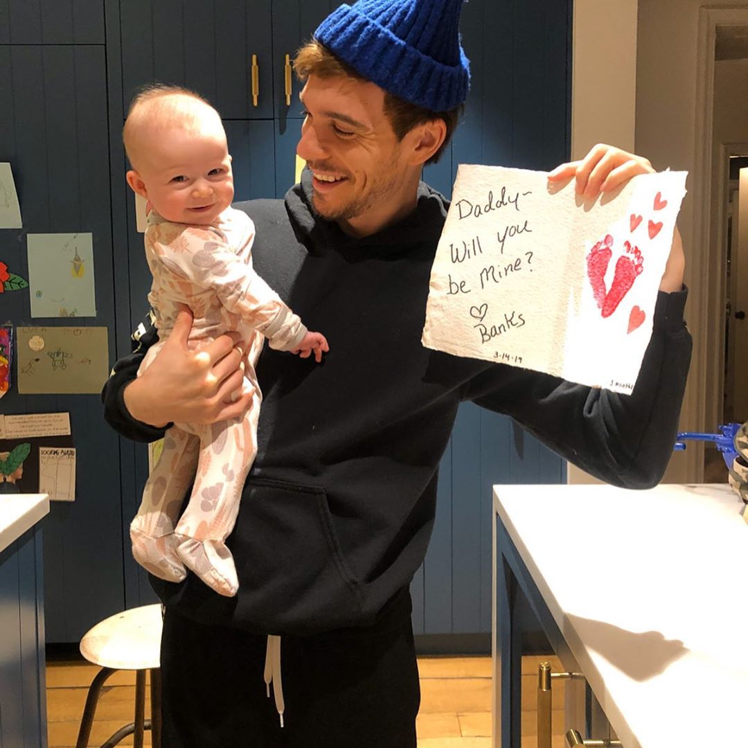 25 oktober 2019: Happy 1st Birthday to our sweet, little, insane Banks Bair. The amount of joy, love, laughter and life you’ve brought into our hearts is immeasurable and there are no words to do justice the force that is you in a high chair eating a croissant. Being your father is truly the greatest gift of my life and every “phase” continues to be a “this is the best part” moment... accompanied by a little heartbreak knowing how fast it goes and how delicate every minute of every day is. Even in the depths of your 4 month screaming concert, I was honored to be the one to cradle you through it - after mom did the heavy lifting & needed a break, you TOTALLY let me pretend I was the first call. I am grateful for that. Watching you discover every sound,taste, step, feeling, song, word, and comfort is the blessing of a lifetime. I’m so blown away that we’re the ones who get to hold your hand through your firsts.
Your mom is a powerhouse when it comes to all things life: but she shines on a completely different level as your mommy. You’ll grow up to see just how lucky you are , but I know you already know. And your big bruvah couldn’t possibly love his little sister more than he does. He, too, sets the bar higher than you could reach on his shoulders and looks out for you in ways that I know will make you feel safe and protected for the rest of your life.
I’m sorry for the croissant carbs. I’m sorry I let you take a sip of my coffee (but you scream so loud when I don’t) I’m sorry that I hurt your hair when I take your bow out. I’m sorry that I don’t always know how the buttons or zippers work on your dresses. I’m sorry for all the sad songs in the car I usually listen to. But I love you something beyond and this was the best year of my life. Happy birthday baba.
